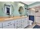 Modern bathroom with double sinks, quartz countertop, and a tiled shower at 364 Waterfall Dr, Spring Hill, FL 34608