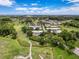 An aerial view of the property location within a community with trees at 3712 Trophy Blvd # 3712, New Port Richey, FL 34655