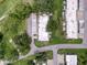 Aerial view showcases the property's roof, driveway and parking area at 3712 Trophy Blvd # 3712, New Port Richey, FL 34655