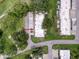 Aerial view showcases the property's roof, driveway and parking area at 3712 Trophy Blvd # 3712, New Port Richey, FL 34655