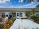 Outdoor patio featuring mature landscaping and room for outdoor relaxation at 3712 Trophy Blvd # 3712, New Port Richey, FL 34655