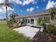 Landscaped patio with room for outdoor seating and entertaining at 3712 Trophy Blvd # 3712, New Port Richey, FL 34655