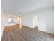 Open concept living room features modern floors and white walls at 3712 Trophy Blvd # 3712, New Port Richey, FL 34655