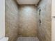 Shower featuring grey tile surround and grey tile floors at 3712 Trophy Blvd # 3712, New Port Richey, FL 34655
