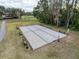 Enjoy a game of volleyball on the community court with available seating for friends and Gathering at 3712 Trophy Blvd # 3712, New Port Richey, FL 34655