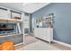 Playful bedroom space featuring a loft bed, cozy seating, and lots of room at 3885 Villamore Ln, Odessa, FL 33556