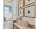 Welcoming entryway with bench seating and decorative pictures, creating a warm and inviting atmosphere at 3885 Villamore Ln, Odessa, FL 33556