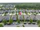 Neighborhood street featuring well-maintained homes and landscaping, creating a welcoming curb appeal at 3885 Villamore Ln, Odessa, FL 33556