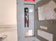 Electrical panel with labeled circuits and maintenance records at 4420 Sawgrass Blvd, New Port Richey, FL 34653