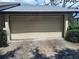 Close-up of a well-maintained garage door with a neutral finish at 4420 Sawgrass Blvd, New Port Richey, FL 34653