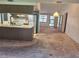 Open floor plan shows the living room with entry door adjacent to the kitchen at 4420 Sawgrass Blvd, New Port Richey, FL 34653