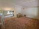 Bright living room showcasing an open layout and vaulted ceilings at 4420 Sawgrass Blvd, New Port Richey, FL 34653