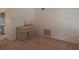 Living room with a piano, carpeted floors, and easy access to the dining area at 4420 Sawgrass Blvd, New Port Richey, FL 34653