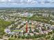 Aerial view of the property and the surrounding neighborhood at 4481 Birchfield Loop, Spring Hill, FL 34609