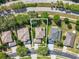 Aerial view of the property showcasing its location and surrounding landscape at 4481 Birchfield Loop, Spring Hill, FL 34609