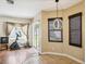 Bright breakfast nook with modern light fixture and sliding glass doors for outdoor access at 4481 Birchfield Loop, Spring Hill, FL 34609