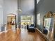 Spacious living room with hardwood floors leading to an outdoor patio at 4481 Birchfield Loop, Spring Hill, FL 34609