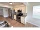 Well-equipped kitchen with stainless steel appliances and neutral color palette at 4702 Portland Manor Dr, New Port Richey, FL 34655