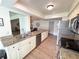 Well-equipped kitchen with stainless steel appliances and granite countertops at 4702 Portland Manor Dr, New Port Richey, FL 34655
