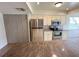 Spacious kitchen with granite countertops, stainless appliances, and ample storage at 4702 Portland Manor Dr, New Port Richey, FL 34655