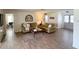 Inviting living room with comfortable seating, decorative accents, and natural light at 4702 Portland Manor Dr, New Port Richey, FL 34655