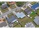 An aerial view showcasing the neighborhood with well-maintained homes and green spaces, offering a glimpse of community living at 5321 Mosaic Dr, Holiday, FL 34690