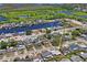 This aerial view highlights the property's close proximity to waterways, with easy access to boating and water activities at 5321 Mosaic Dr, Holiday, FL 34690