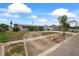 Exterior view of the home showcasing its landscaping, driveway, and serene neighborhood at 5321 Mosaic Dr, Holiday, FL 34690