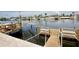Waterfront dock with boat lift and seating at 5339 Bowline Bnd, New Port Richey, FL 34652