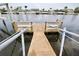 Close up view of a dock and waterfront seating at 5339 Bowline Bnd, New Port Richey, FL 34652