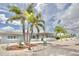 Charming single-story home features well-maintained landscaping, a screened patio, and a serene, inviting exterior at 5339 Bowline Bnd, New Port Richey, FL 34652