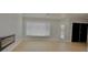 Bright living room features modern upgrades, including a linear fireplace, new windows, and stylish lighting at 5339 Bowline Bnd, New Port Richey, FL 34652