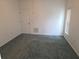 The room has neutral carpet, closet and natural light at 5373 Frost Rd, Spring Hill, FL 34606