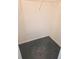 A carpeted walk-in closet featuring a wire shelving system for organized storage at 5373 Frost Rd, Spring Hill, FL 34606