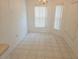 Cozy dining area with tiled flooring and ample natural light at 5373 Frost Rd, Spring Hill, FL 34606