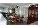 A dining room with mirror wall and lovely hutch at 5434 Chad Pl # 14, New Port Richey, FL 34652