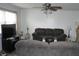 A living room with large window and comfortable gray sofa at 5434 Chad Pl # 14, New Port Richey, FL 34652