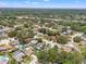 Aerial view showcasing the residential neighborhood and surrounding greenery at 5502 Bluejay Ln, Tampa, FL 33625