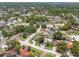 Aerial view of the neighborhood showcasing lush greenery and well maintained lawns at 5502 Bluejay Ln, Tampa, FL 33625