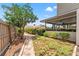 Nice backyard featuring a stone pathway and screened-in porch at 5502 Bluejay Ln, Tampa, FL 33625