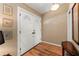 Inviting foyer with double front doors, wood flooring, and classic interior design at 5502 Bluejay Ln, Tampa, FL 33625