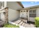 Entrance to the home featuring double front doors, stone accents, and exterior lighting at 5502 Bluejay Ln, Tampa, FL 33625