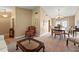 Open-concept space featuring a dining area, carpet flooring, and a classic interior design at 5502 Bluejay Ln, Tampa, FL 33625