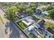 Overhead shot featuring the home, fenced yard and surrounding neighborhood at 5520 Fulmar Dr, Tampa, FL 33625