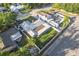 Drone shot showcasing the house, backyard, and outdoor entertainment area at 5520 Fulmar Dr, Tampa, FL 33625