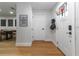 Inviting foyer boasts sleek wood floors and neutral walls, creating a bright and welcoming space at 5520 Fulmar Dr, Tampa, FL 33625