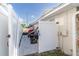 Side yard showing lawn equipment and boat at 5520 Fulmar Dr, Tampa, FL 33625