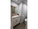 Bright bathroom featuring granite countertop vanity at 5555 Gulf Blvd # 315, St Pete Beach, FL 33706