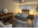 Charming bedroom featuring a comfortable bed, soft lighting, and stylish furnishings at 5555 Gulf Blvd # 315, St Pete Beach, FL 33706