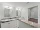 Bathroom features granite counters, double sinks and vanity at 5724 Casson Ave, New Port Richey, FL 34652